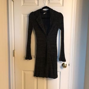 Long gray and black sweater.